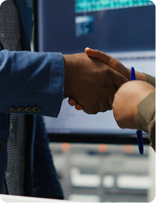 Business handshake symbolising debt agreements